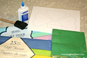 Materials needed for tissue covered shamrock craft.