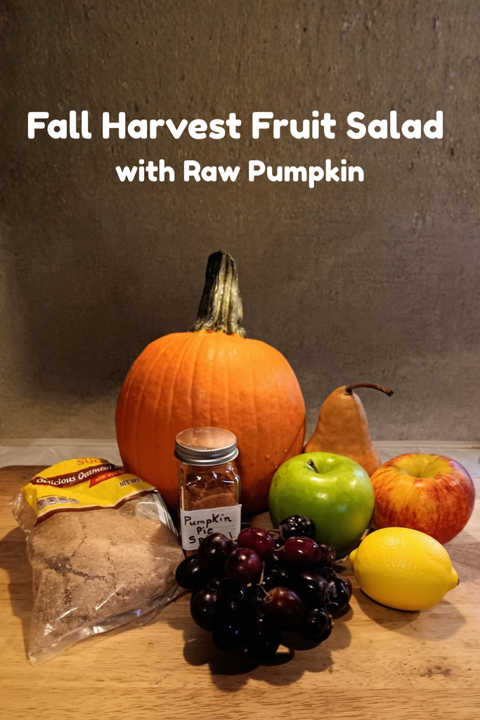 Fall Harvest Fruit Salad with raw pumpkin, apples, pear, grapes, lemon, brown sugar, and pumpkin pie spice.